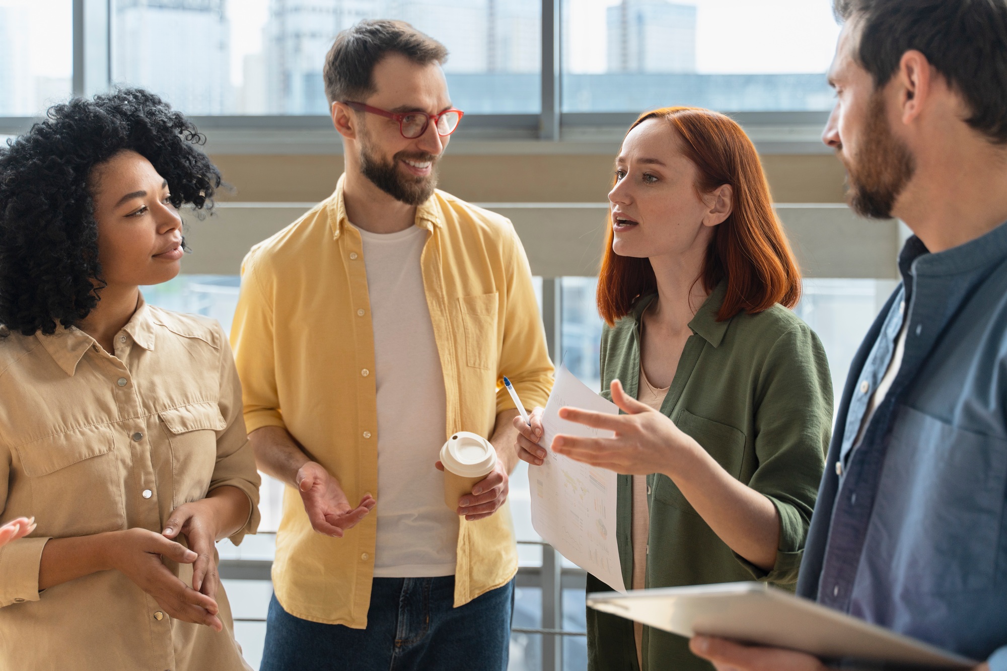 Multiethnic business people working together in the office, planning a marketing strategy together